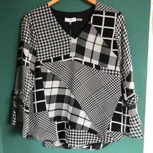 NWT Calvin Klein Black and White Patterned Patchwork Tunic Top. Size XS.